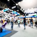 Abstract blurred defocused tradeshow event exhibition, business convention show, job fair, technology expo. Organization company trade fair event. Marketing advertisement concept.